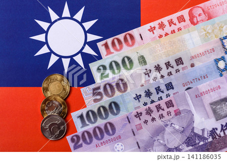 Taiwan, Taiwanese paper banknotes and coins, dollars of various denominations. Taiwanese dollars Taiwan, Taiwanese paper banknotes and coins, dollars of various denominations. Taiwanese dollars 141186035