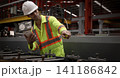 Ai using. Engineers and technicians use AI inspect industrial equipment. Worker using Ai digital tools and augmented reality technology to inspect industrial machinery. Smart ai factory innovation. 141186842
