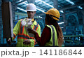 Ai using. Engineers and technicians use AI inspect industrial equipment. Worker using Ai digital tools and augmented reality technology to inspect industrial machinery. Smart ai factory innovation. 141186844
