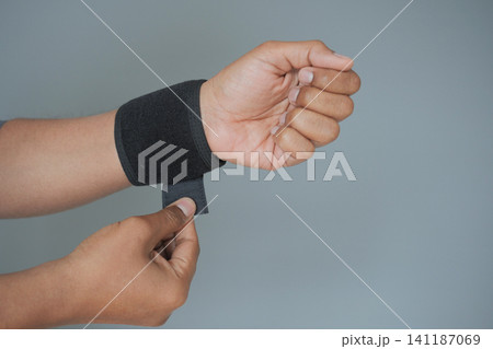 Wrist support is secured for enhanced comfort and stability 141187069