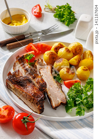 British Pub Style Classic Roasted Pork Ribs 141187604
