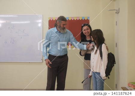 The young children are learning in the classroom. The young children are learning in the classroom. 141187624