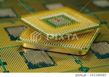 PC processor close up highlighting the network of pins on its underside PC processor close up highlighting the network of pins on its underside 141188085