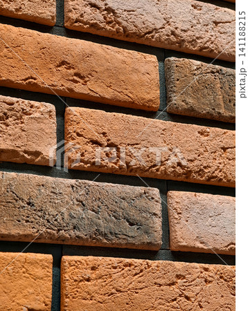 Decorative panels with brick stone and tile effect finishes arranged in a building materials store highlighting realistic and stylish surface solutions 141188215