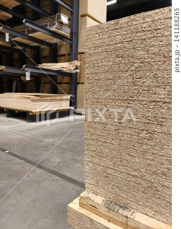 Oriented Strand Board or OSB, construction panel for wall sheathing roofing and other wood product application sold in building supermarket 141188265