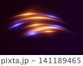 Glowing light streaks forming an energetic movement on a dark background 141189465