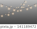 String lights with glowing vintage edison style bulbs illuminating a decorative festive scene 141189472