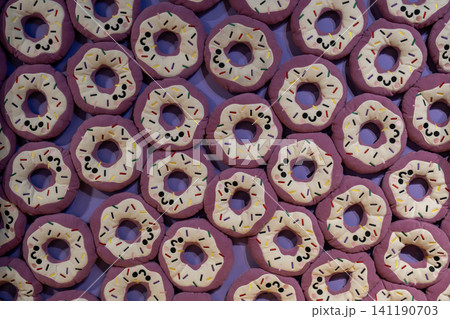 Colorful Artificial Donuts Background Pattern. 141190703