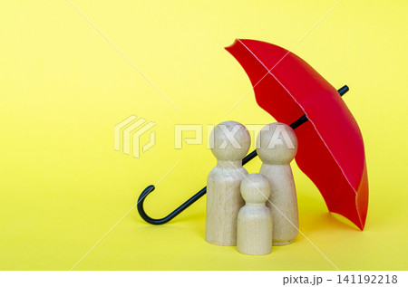 Family figures with red umbrella representing security and insurance with customizable space for text. Family figures with red umbrella representing security and insurance with customizable space for text. 141192218