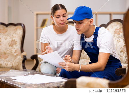 Master gives a contract for the provision of services to a young woman for signature 141193876