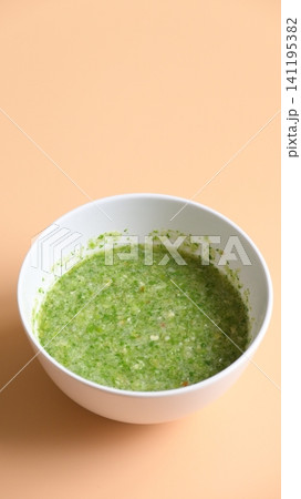 Thai spicy seafood dipping sauce on white bowl Thai spicy seafood dipping sauce on white bowl 141195382