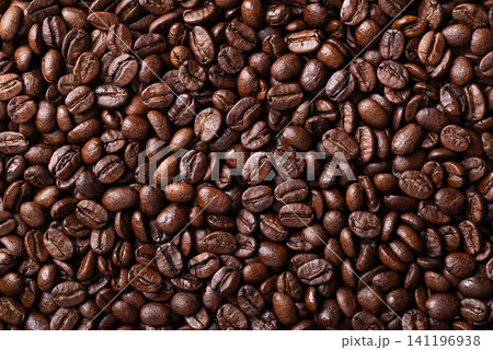 Close-up of medium dark roasted coffee bean texture background, Arabica coffee Close-up of medium dark roasted coffee bean texture background, Arabica coffee 141196938