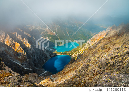 Morskie Oko lake view from the foggy mountain, High Tatras 141200118