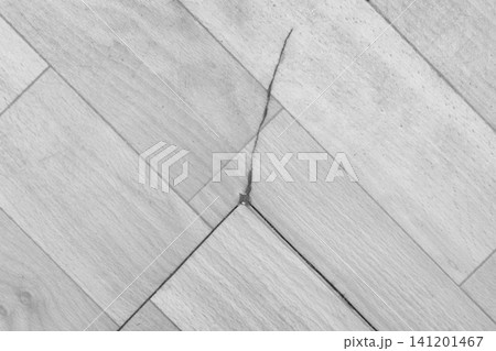 Broken torn linoleum old rubber polymer PVC floor damage material flooring repair gray object Broken torn linoleum old rubber polymer PVC floor damage material flooring repair gray object 141201467