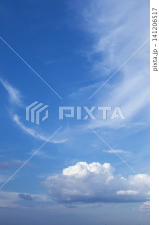 Blue sky with dramatic clouds. Cloudy daytime sky with soft clouds. Blue sky with dramatic clouds. Cloudy daytime sky with soft clouds. 141206517