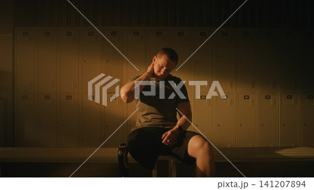 Resilient Male Athlete with Leg Prosthesis Ready to Start Gym Workout Resilient Male Athlete with Leg Prosthesis Ready to Start Gym Workout 141207894