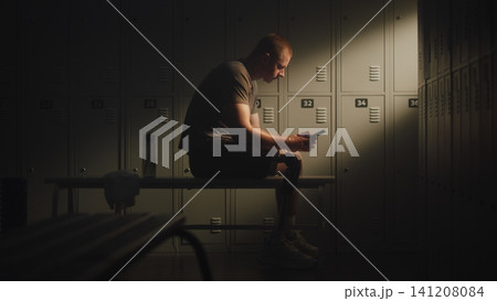 Adaptive Athlete Filling Out Rehabilitation Progress Diary on Smartphone Adaptive Athlete Filling Out Rehabilitation Progress Diary on Smartphone 141208084