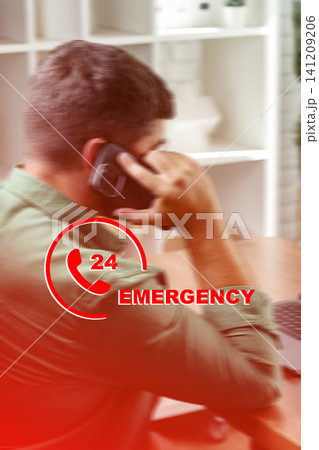 Emergency service worker on the phone during an urgent situation in the office Emergency service worker on the phone during an urgent situation in the office 141209206