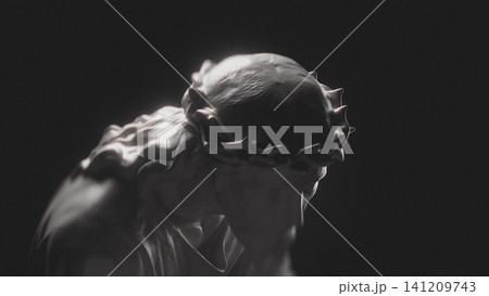 Silhouette of Bowed Head of Jesus Christ Sculpture in Crown of Thorns on Black Background 141209743