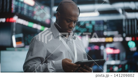 Senior Broker Analyzing Market Trends With Calm Confidence 141209802