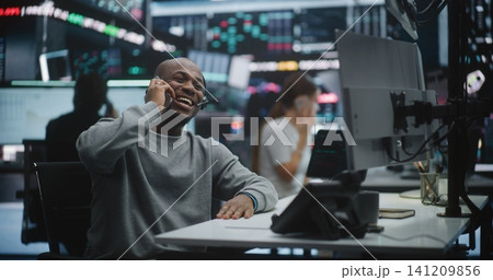 Joyful Broker Pleased Massive Profit Surge, Calls on Smartphone Joyful Broker Pleased Massive Profit Surge, Calls on Smartphone 141209856