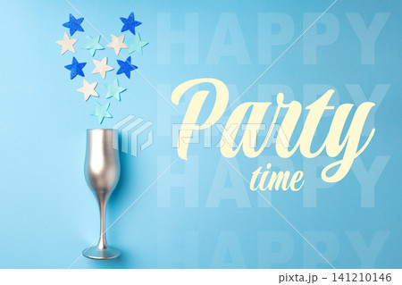 Celebrating a happy birthday with stars and a silver glass on a blue background Celebrating a happy birthday with stars and a silver glass on a blue background 141210146