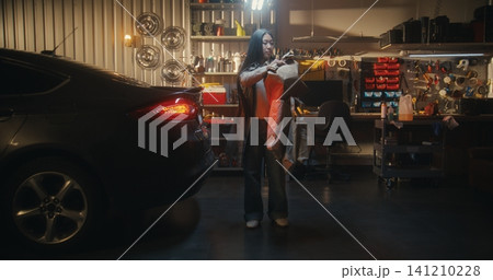 After Successful Shopping Trip, Young Woman Balances Tote Bags After Successful Shopping Trip, Young Woman Balances Tote Bags 141210228