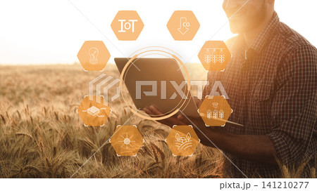 Smart farm technology connects farmers and crops through data and tools in sunny fields Smart farm technology connects farmers and crops through data and tools in sunny fields 141210277