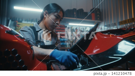 Young Female Holding Tablet With Digital Wiring Diagram 141210478