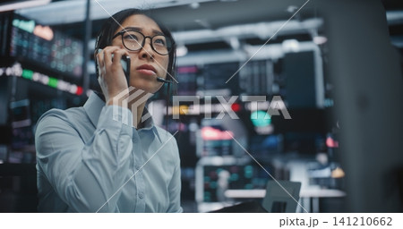 Professional Woman Reports Critical Market Information Contact on Smartphone Professional Woman Reports Critical Market Information Contact on Smartphone 141210662