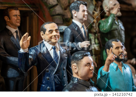 Naples, italy. December 28, 2024. Handcrafted figurines of international political leaders creating social satire on display in a traditional artisan workshop in naples, italy 141210742