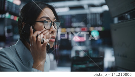Trader Calls Urgently on Mobile Phone, Distressed Crashing Market Indices on Screens Trader Calls Urgently on Mobile Phone, Distressed Crashing Market Indices on Screens 141210806