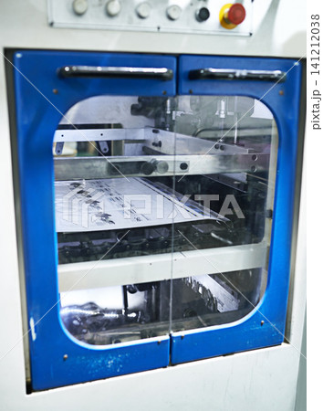 Industrial, printer and machine for production, newspaper and magazine with packaging, distribution and publication. Inside, room and printing factory for media, industry, and machinery or equipment Industrial, printer and machine for production, newspaper and magazine with packaging, distribution and publication. Inside, room and printing factory for media, industry, and machinery or equipment 141212038