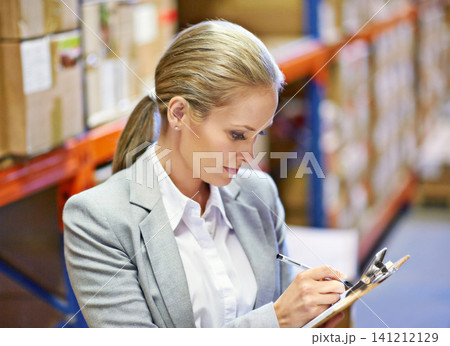 Inspector, writing and woman in warehouse with inventory for quality control and freight distribution. Logistics, person and wholesale supplier with stock checklist in supply chain for inspection Inspector, writing and woman in warehouse with inventory for quality control and freight distribution. Logistics, person and wholesale supplier with stock checklist in supply chain for inspection 141212129