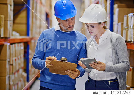 Checklist, tablet or people in warehouse for logistics info for a delivery order, boxes or website in a plant. Online, teamwork or factory workers with product, package or wholesale cargo shipping Checklist, tablet or people in warehouse for logistics info for a delivery order, boxes or website in a plant. Online, teamwork or factory workers with product, package or wholesale cargo shipping 141212268