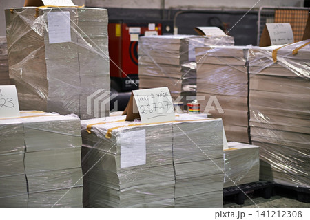 Warehouse, paper and manufacturing with distribution or packaging at wholesale, delivery and supplier. Logistics, storage and factory with machines or equipment in industrial storehouse for press Warehouse, paper and manufacturing with distribution or packaging at wholesale, delivery and supplier. Logistics, storage and factory with machines or equipment in industrial storehouse for press 141212308