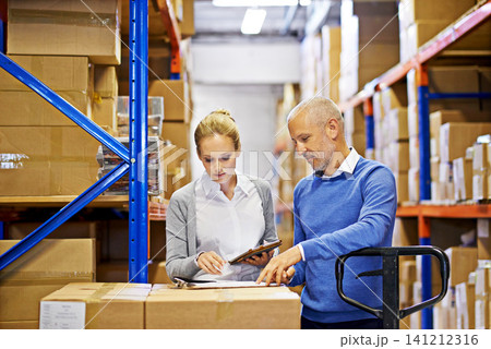 Technology, checklist and business people in distribution warehouse for logistics, supply chain and cardboard box. Package, ecommerce and employees with tablet for shipping, cargo and stock taking 141212316