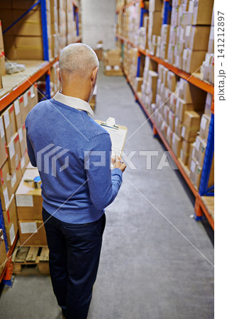 Shipping, warehouse and man with clipboard for inspection, supply chain and quality control checklist. Factory, distribution and person with documents for logistics, manufacturing and production Shipping, warehouse and man with clipboard for inspection, supply chain and quality control checklist. Factory, distribution and person with documents for logistics, manufacturing and production 141212897
