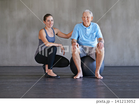 Portrait, smile and physiotherapist with senior man on ball in gym for rehabilitation, exercise or healthy body. Physical therapy, elderly and happy person with personal trainer for support on mockup Portrait, smile and physiotherapist with senior man on ball in gym for rehabilitation, exercise or healthy body. Physical therapy, elderly and happy person with personal trainer for support on mockup 141213052