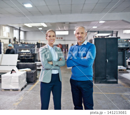 Business people, management and portrait with arms crossed in factory with confidence for career in printing industry. Mature man, woman and happiness in warehouse for inspection and collaboration Business people, management and portrait with arms crossed in factory with confidence for career in printing industry. Mature man, woman and happiness in warehouse for inspection and collaboration 141213081