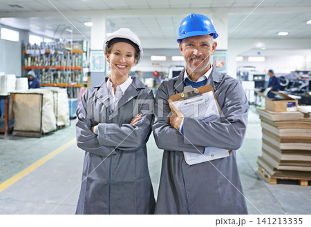 Portrait, people or safety helmet in logistics, clipboard or paper delivery in warehouse building. Mature man, woman or checklist for product, stock or shipping administration as supply chain project Portrait, people or safety helmet in logistics, clipboard or paper delivery in warehouse building. Mature man, woman or checklist for product, stock or shipping administration as supply chain project 141213335