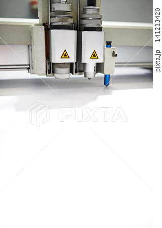 Closeup, industrial and printer for production, newspaper and magazine with packaging, distribution and publication. Inside, room and printing factory for media, industry and machinery or equipment 141213420