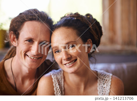 Portrait, smile and love for happy couple, couch and living room in home. Dreadlocks, marriage or face for romance and affection on weekend, house or lounge or partner together for bonding on holiday 141213706