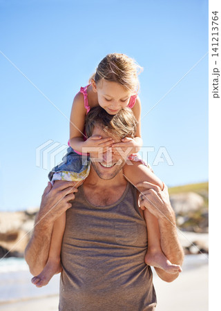 Smile, dad and shoulder to carry child for family, game and bonding together on summer beach day. Blue sky, papa and young female kid for fun walk, happiness and sunshine on vacation in Brazil 141213764