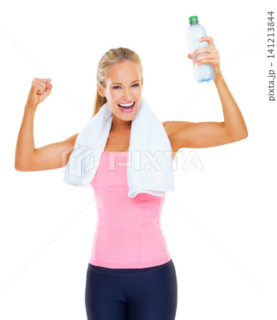 Celebration, portrait and athlete with water bottle, smile and happiness for fitness, health and training. White background, wellness and woman with liquid to drink for hydration of girl and thirst 141213844