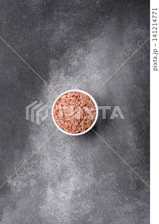 Fish, canned tuna chunks in brine for sandwiches and salads. Canned tuna Fish, canned tuna chunks in brine for sandwiches and salads. Canned tuna 141214771