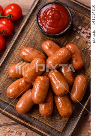 Chicken or pork grilling sausages with garlic, salt, and spices. Grilling sausages 141214810