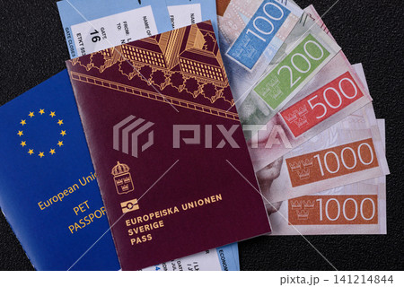 Sweden, swedish passport or id document with tickets for flight, travel. Swedish passport Sweden, swedish passport or id document with tickets for flight, travel. Swedish passport 141214844