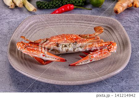 Fresh cooked crab on ceramic plate with spices Fresh cooked crab on ceramic plate with spices 141214942