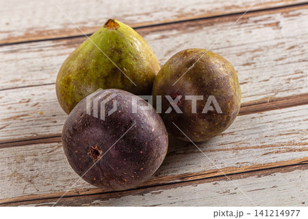 Fresh figs on rustic wooden surface 141214977
